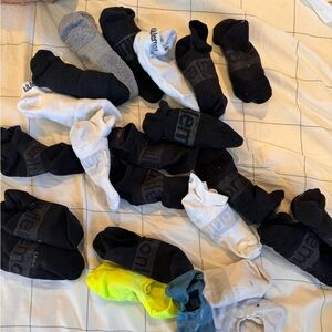 23 pairs of Lululemon no show and ankle tab socks